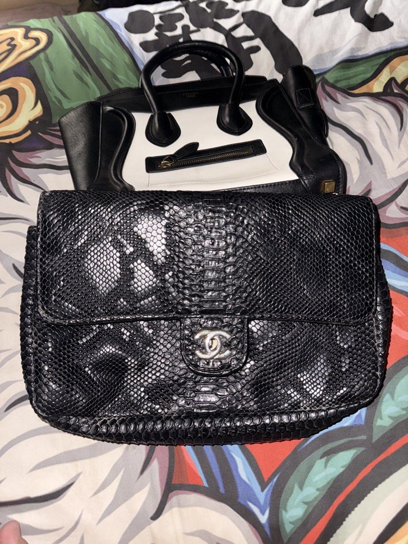 Chanel Black Python Flap Bag (Category: Luxury Bags & Wallets) located in Binalonan. Submitted by katkatt121 (Listing ID 1456611982, Image 2). Description: - Genuine black python skin flap bag - Elegant silver chain strap - Striking red interior lining - Iconic CC logo clasp - Medium size, perfect for essentials - Versatile wear: crossbody or shoulder - A stunning statement piece to elevate any outfit RUSH! NEGOTIABLE ACTUAL PHOTO IS POSTED.
