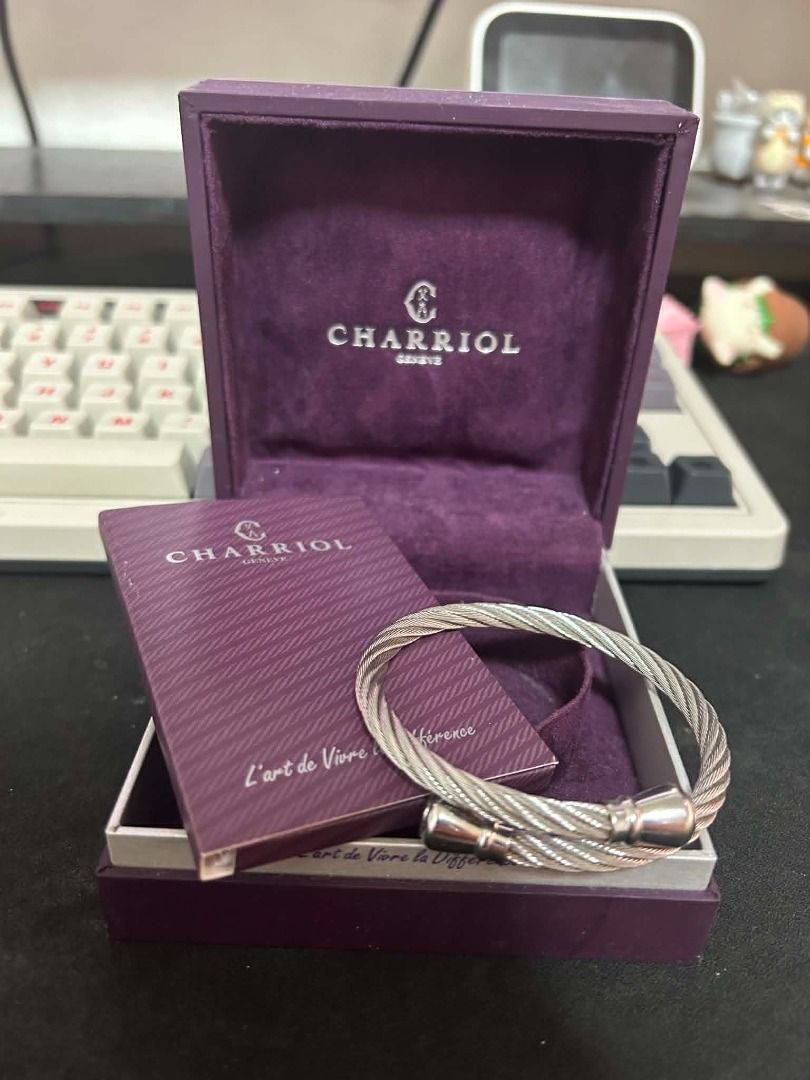 Charriol Geneve Celtic Bangle with Box and Guarantee Card (Category: Jewelry) located in Cainta. Submitted by jm2418 (Listing ID 1456773673, Image 1). Description: Selling a Charriol Geneve Celtic Bangle with Box and Guarantee Card for PHP 5,000. Authentic with box and guarantee card. Lightly used. Meet-ups preferred..