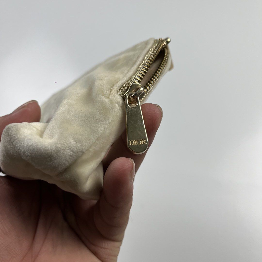 Christian Dior (Category: Luxury Bags & Wallets) located in Lucena. Submitted by RAGGGGSSSS (Listing ID 1456749042, Image 3). Description: Christian Dior Cosmetic Pouch Verygood Condition Needwash only Authentic.