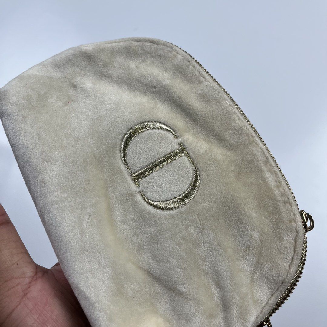 Christian Dior (Category: Luxury Bags & Wallets) located in Lucena. Submitted by RAGGGGSSSS (Listing ID 1456749042, Image 2). Description: Christian Dior Cosmetic Pouch Verygood Condition Needwash only Authentic.