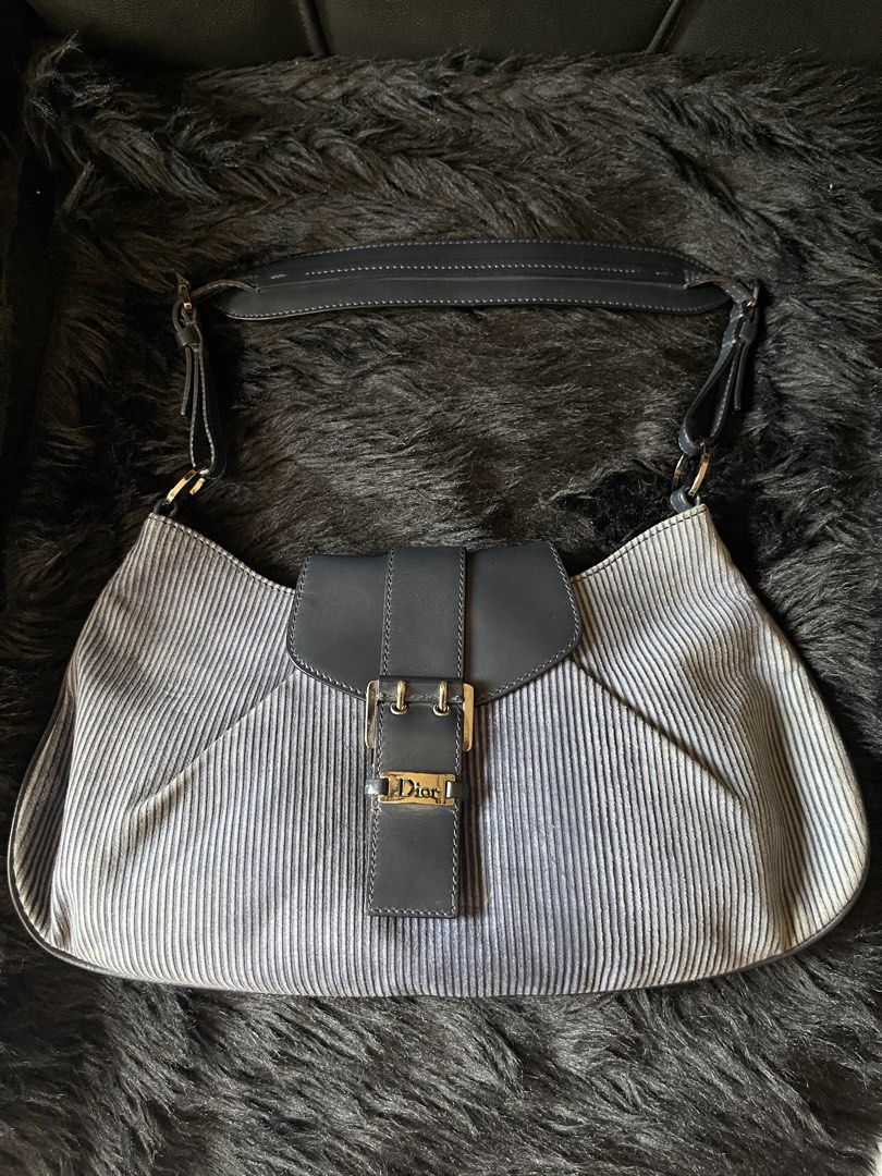 SALE! Christian Dior Corduroy Shoulder Bag (Category: Luxury Bags & Wallets) located in Davao. Submitted by boodle4lyf (Listing ID 1456654331, Image 1). Description: G.A Christian Dior in corduroy material + navy blue color. Item is in very good condition with little to no signs of use. Strap and hardwares are still crisp. Color is still vibrant in person..
