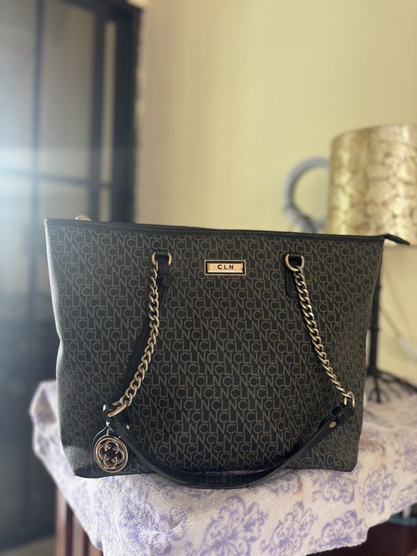 CLN Monogram Tote Bag with Chain Detail (Category: Shoulder Bags) located in Manila. Submitted by princess511 (Listing ID 1456669189, Image 1). Description: NEGOTIABLE -Classic CLN tote bag - All-over monogram print - Stylish chain straps - Cute charm detail - Spacious interior - Secure zipper closure - Ideal for daily use or weekend getaways.