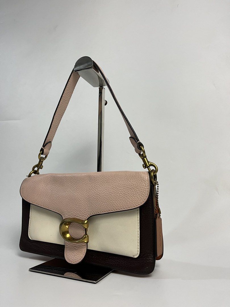 Coach Tabby 26 Shoulder Bag (Category: Luxury Bags & Wallets) located in Manila. Submitted by streetsavvy (Listing ID 1456695801, Image 2). Description: Coach Tabby 26 Shoulder Bag Width: 10” Height: 6” Depth: 2.5” Strap Drop: 8” Measured in Inches Condition: Very good condition with signs of use Flaw: Dark stain on side hardware Made in Vietnam.