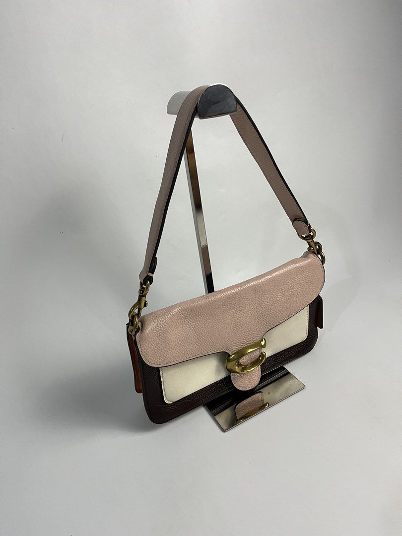 Coach Tabby 26 Shoulder Bag (Category: Luxury Bags & Wallets) located in Manila. Submitted by streetsavvy (Listing ID 1456695801, Image 3). Description: Coach Tabby 26 Shoulder Bag Width: 10” Height: 6” Depth: 2.5” Strap Drop: 8” Measured in Inches Condition: Very good condition with signs of use Flaw: Dark stain on side hardware Made in Vietnam.