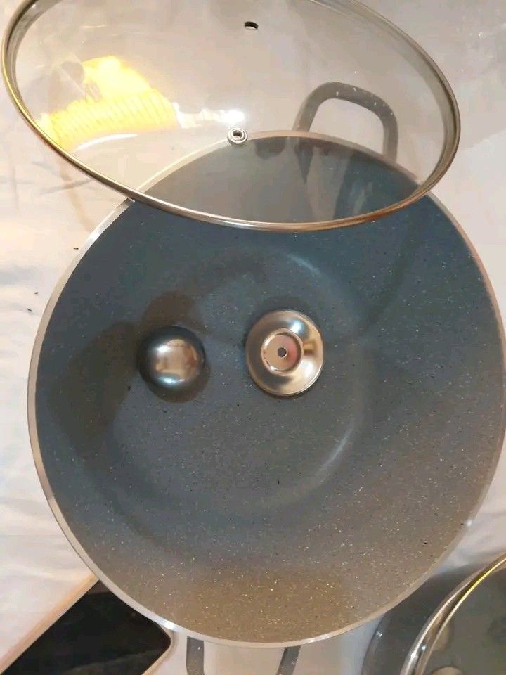Cookware set (Category: Cookware & Accessories) located in Manila. Submitted by rubymielbona (Listing ID 1456606884, Image 3). Description: - Cookware set - Stylish gray color - Comes with glass lids 8 Piece Dessini Granite Non Stick Cookware Set (Induction Ready)Price: ₱2,250 ONLY ‼️(Brand new online sells for up to ₱3,800!) Condition: Brand New / Unused.