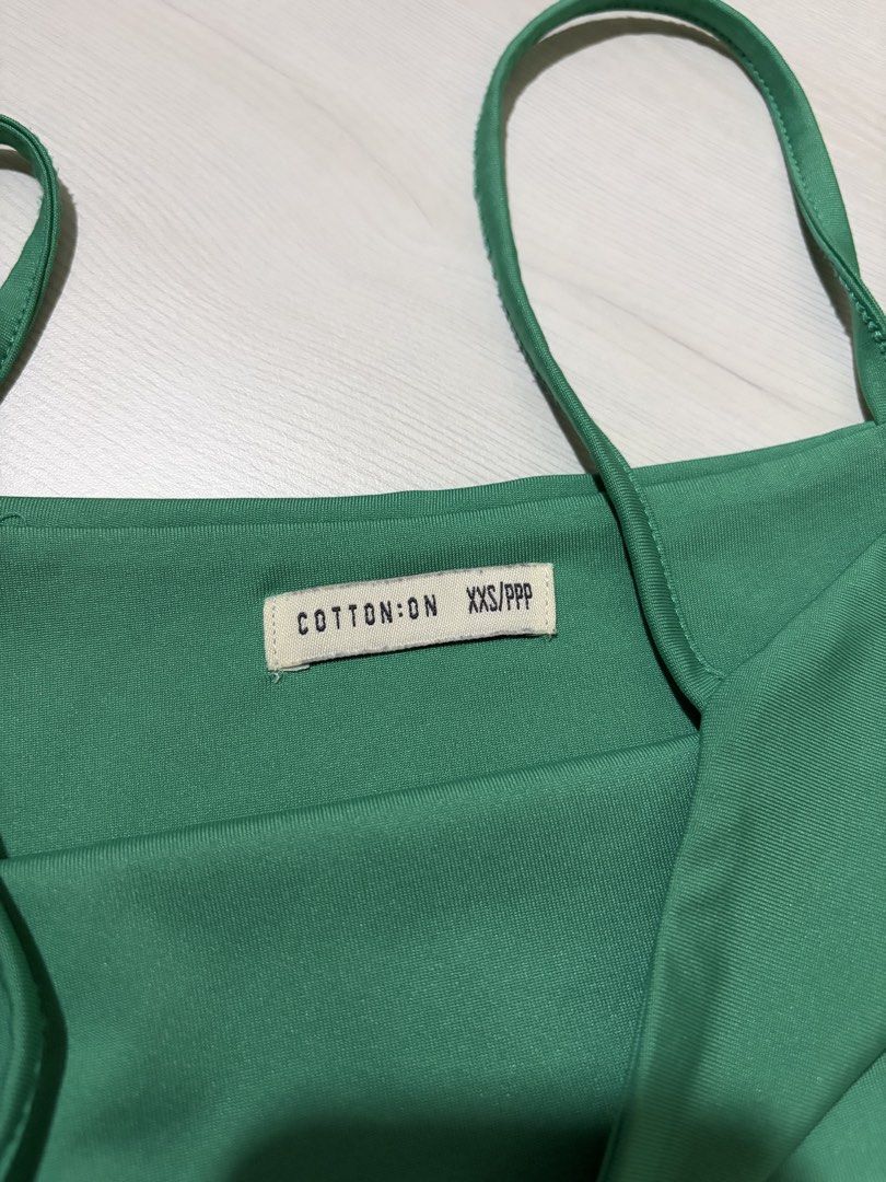 Cotton on green cami top (Category: Others Tops) located in Manila. Submitted by declutter_diariess (Listing ID 1456752736, Image 3). Description: .