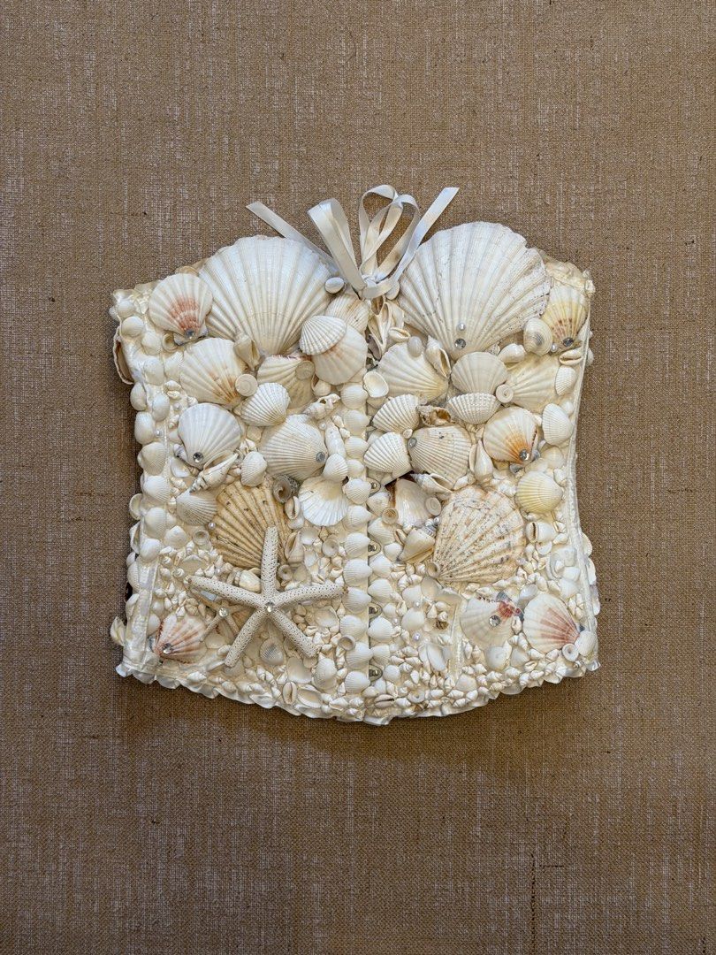 Custom Seashell Pearl Corset (XS-S) (Category: Sets or Coordinates) located in Manila. Submitted by designerarchives.ph (Listing ID 1263657406, Image 1). Description: Top is adjustable Comes with the tulle tutu skirt! Great for siren/mermaid halloween costume. .