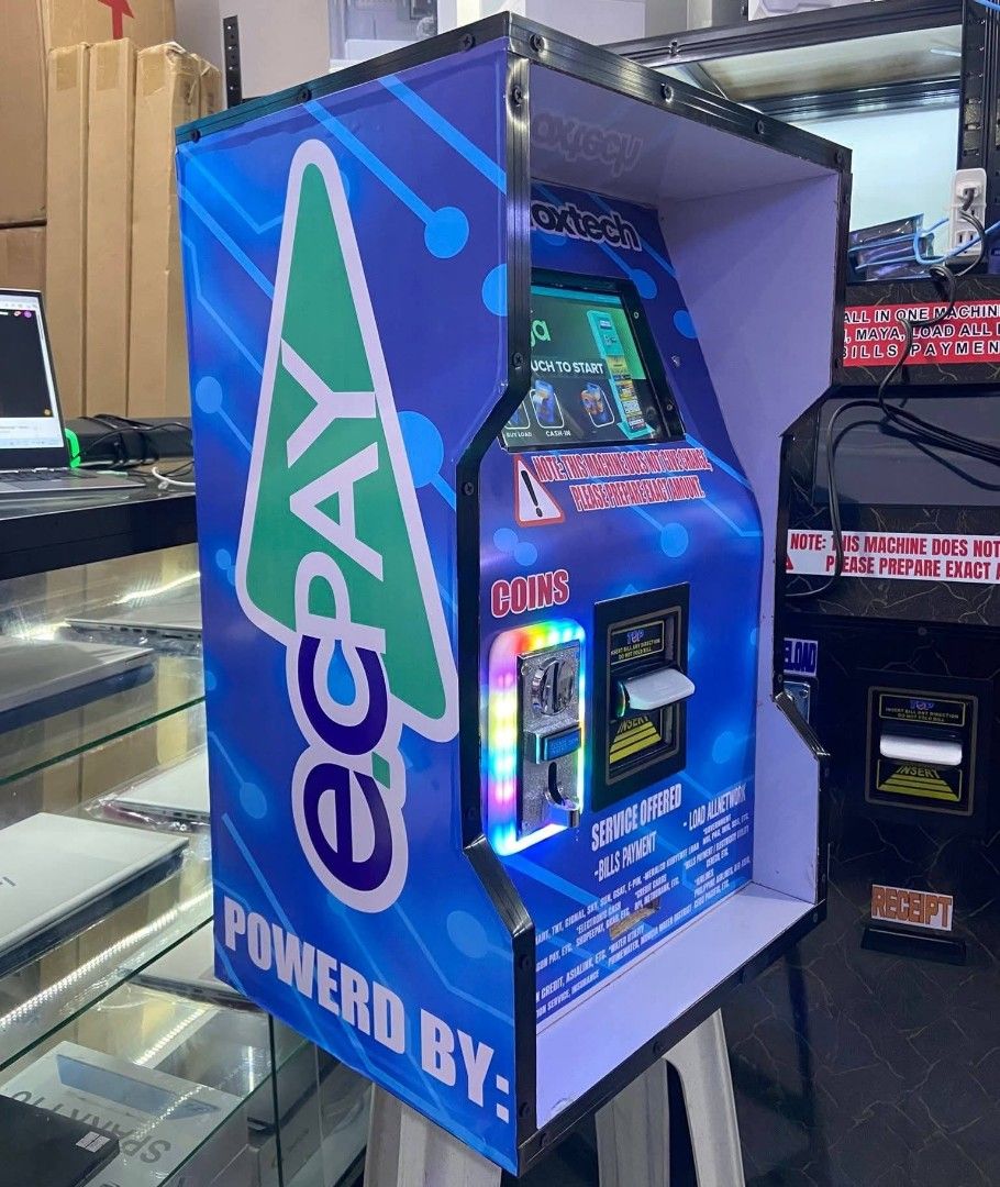 DafoxTech Kiosk Table Top (Category: Industrial Equipment) located in Bacolod City. Submitted by productivejunkie (Listing ID 1456778571, Image 3). Description: DAFOXTECH KIOSK (Powered by: ECPAY) Safe and secure in every transaction 3 in 1 Table Top Services Offered: 🔥Cash in(Gcash, Maya etc.) 🔥E-load All Network(Globe, smart etc.) 🔥Bills Payment(Electricity, water utility, creditcard, government services( up to 600+ billers) - secure with do
