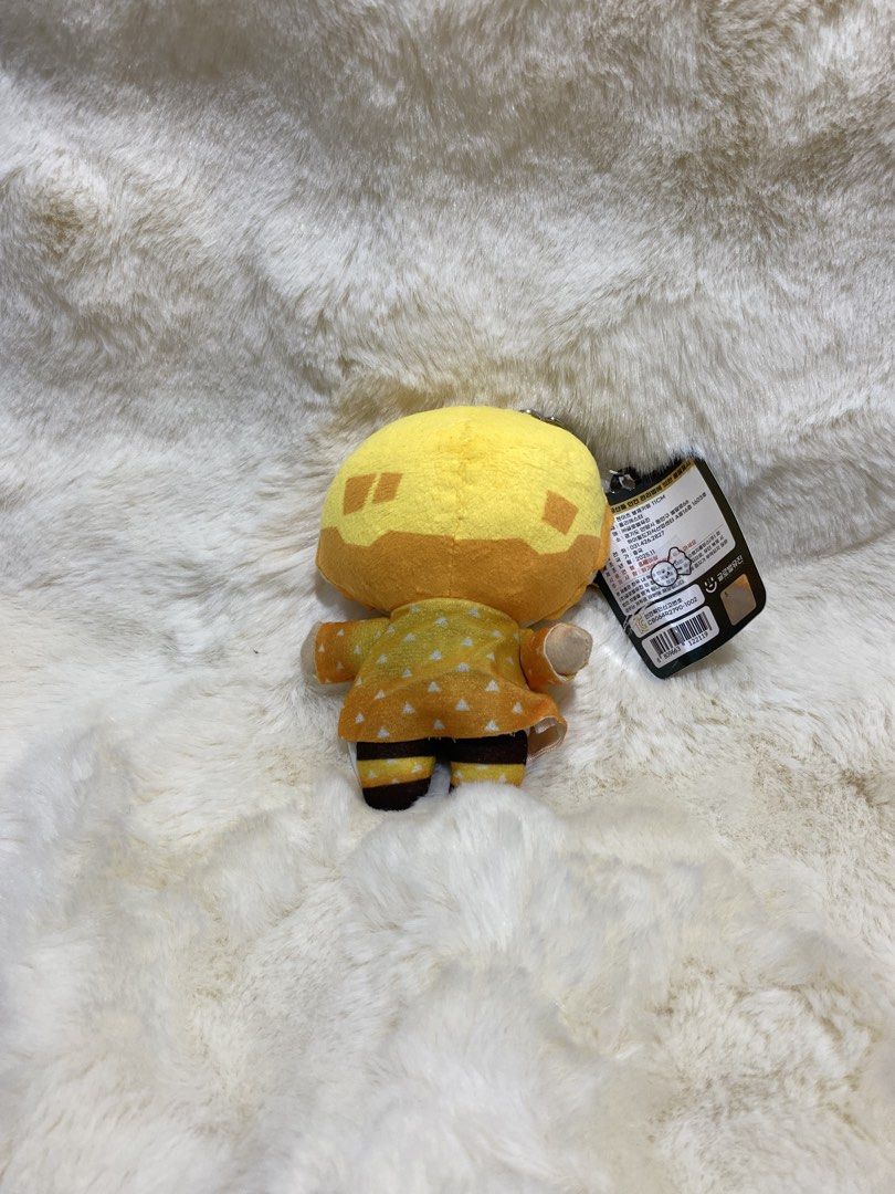 Demon Slayer Zenitsu Agatsuma Chibi Plush charm Keychain (Category: Plushies & Soft Toys) located in Kalibo. Submitted by ollie_stuffshop (Listing ID 1456684263, Image 2). Description: Before you send your inquiries: ❗️Last Price is already posted ❗️Manage your expectations, WYSIWYG ❗️May need washing ❗️Shipping day is every Sunday - Adorable Zenitsu Agatsuma chibi plush from Demon Slayer. - Features a convenient keychain for hanging. - Brand new