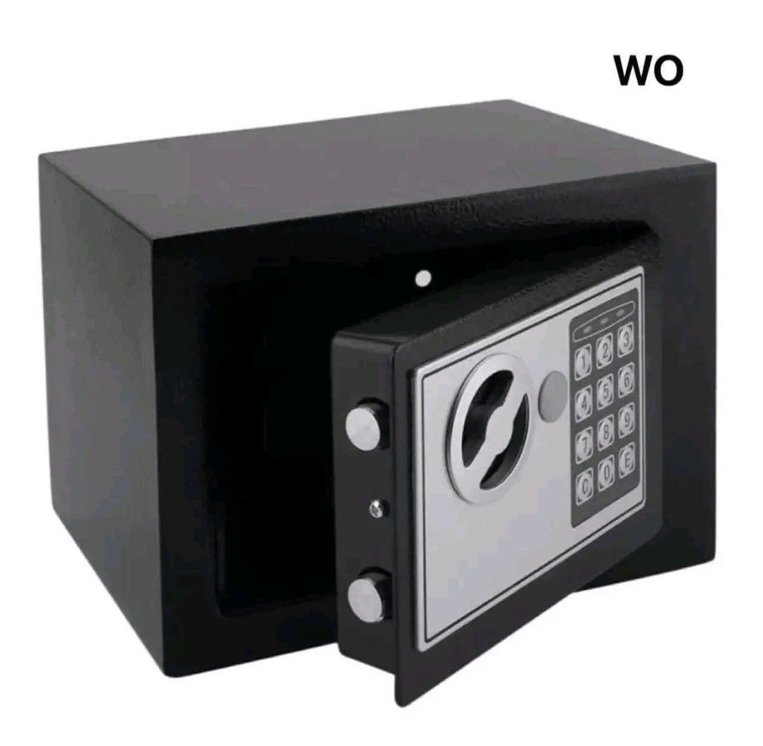 Digital Electronic Safe Box with Keypad Lock (Category: Safe) located in Manila. Submitted by marvieobordo (Listing ID 1456759607, Image 1). Description: - Black digital safe with keypad entry - Includes backup key for access - Compact size, ideal for home or office use - Two strong bolts on the door for enhanced security - Can be mounted on the wall or floor for convenience.