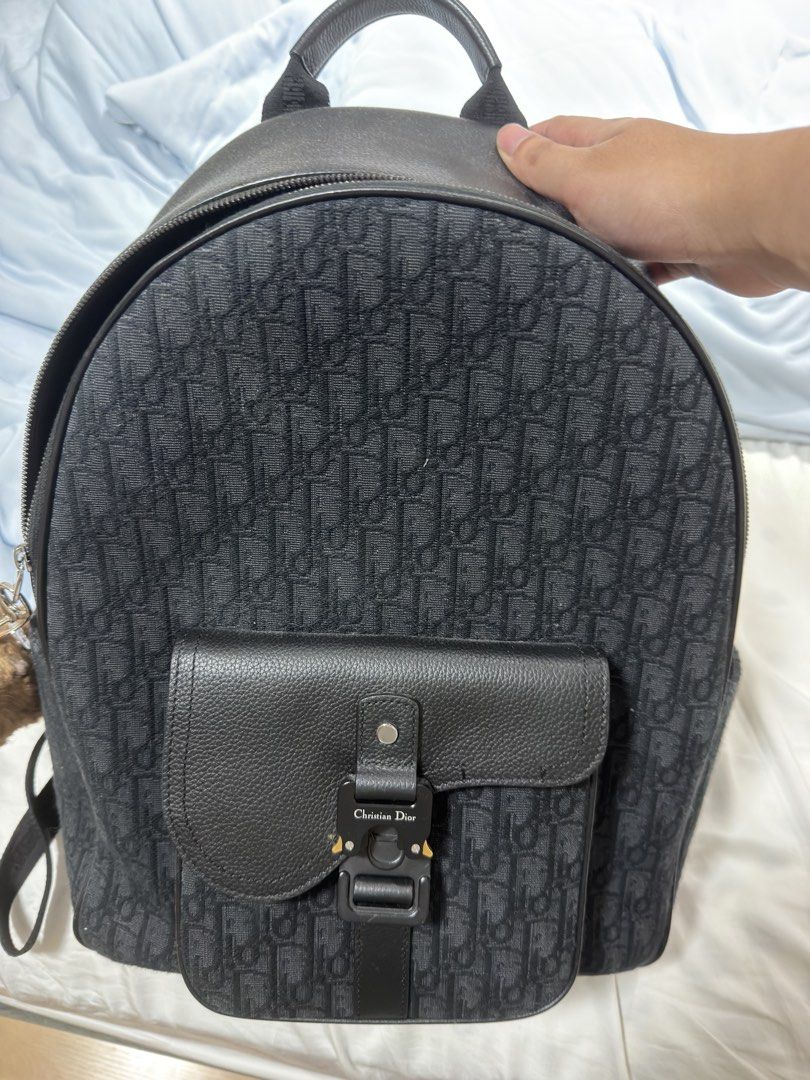 Dior Men’s Saddle Zip Backpack (Category: Luxury Bags & Wallets) located in Manila. Submitted by coolfish_47135c (Listing ID 1456729498, Image 2). Description: Dior Men’s Saddle Zip Backpack RFS- Not used anymore, was used for school.