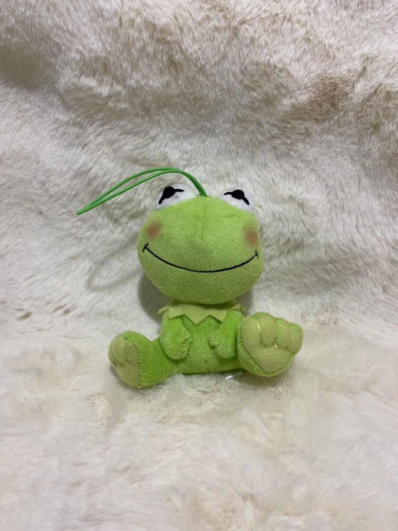 Disney Kermit the Frog Plush charm Keychain (Category: Plushies & Soft Toys) located in Kalibo. Submitted by ollie_stuffshop (Listing ID 1456630652, Image 1). Description: Before you send your inquiries: ❗️Last Price is already posted ❗️Manage your expectations, WYSIWYG ❗️May need washing ❗️Shipping day is every Sunday - Adorable Kermit plush toy - Features a convenient string loop for hanging - Made with soft, green material - Compact and portab