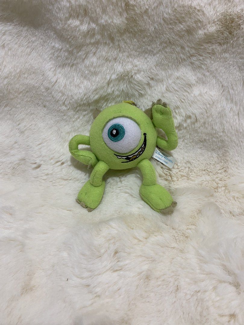 Disney Pixar Mike Wazowski Plush Charm Keychain (Category: Plushies & Soft Toys) located in Kalibo. Submitted by ollie_stuffshop (Listing ID 1456631205, Image 1). Description: Before you send your inquiries: ❗️Last Price is already posted ❗️Manage your expectations, WYSIWYG ❗️May need washing ❗️Shipping day is every Sunday - Cute Mike Wazowski plush keychain - Authentic from Tokyo Disney Resort - Features his signature one eye and grin - Includes