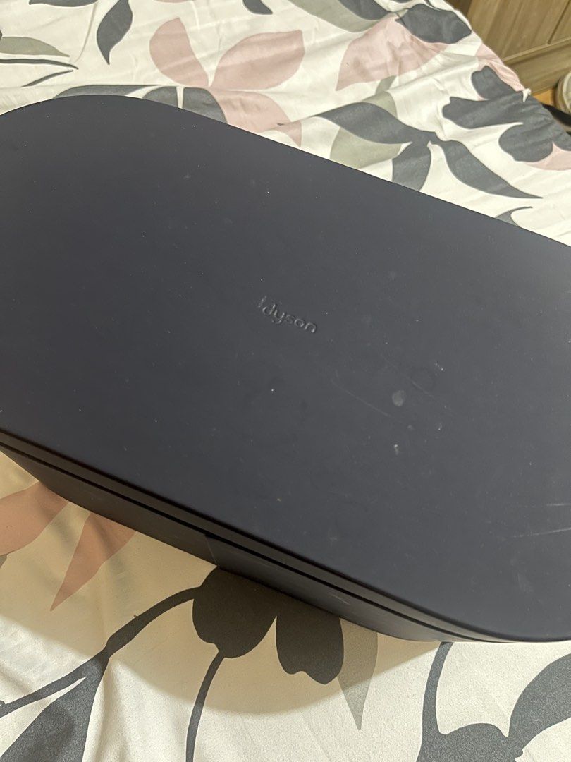 Dyson Airwrap Multi-Styler with Case and Attachments (Category: Hair) located in Makati City. Submitted by kunargel1989 (Listing ID 1456745443, Image 3). Description: - Dyson Airwrap multi-styler - Color: Dark navy/purple - Includes original storage case - Comes with various attachments - Original box included with QR code for setup video, product registration, and attachment guide.