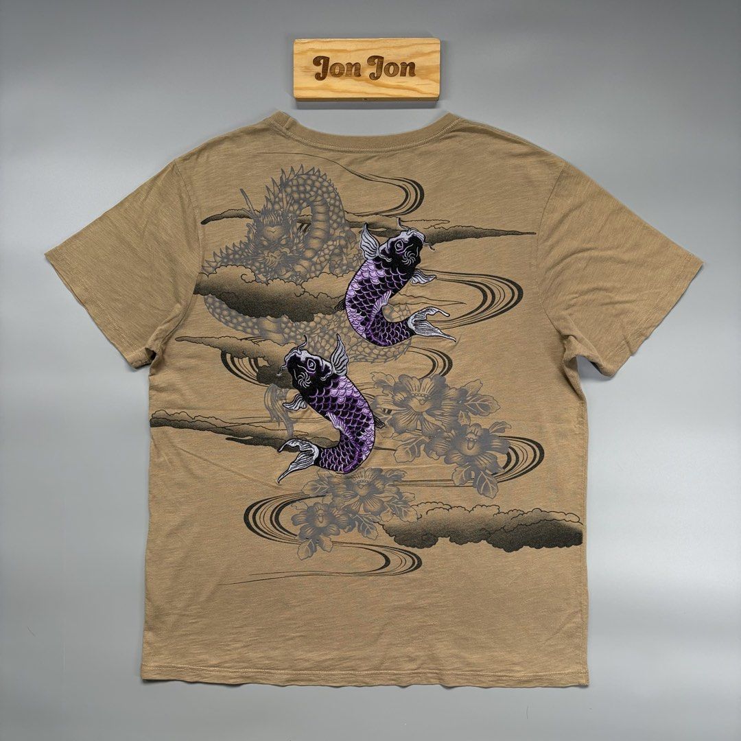 Embroidered Koi Fish (Category: Tshirts & Polo Shirts ) located in Cavite. Submitted by onebeancent (Listing ID 1456616496, Image 2). Description: 🔘Random Embroidered Koi Fish Size: XL Dimension: 23" Width | 28" Length Color: Brown Color Rate: 9/10 Issue: Verygood Condition: 2 pinhole see last 2 pics Price: 250php Additional Shipping Fee (J&T Small Pouch) 75php Luzon 100php visayas 120php mindanao.
