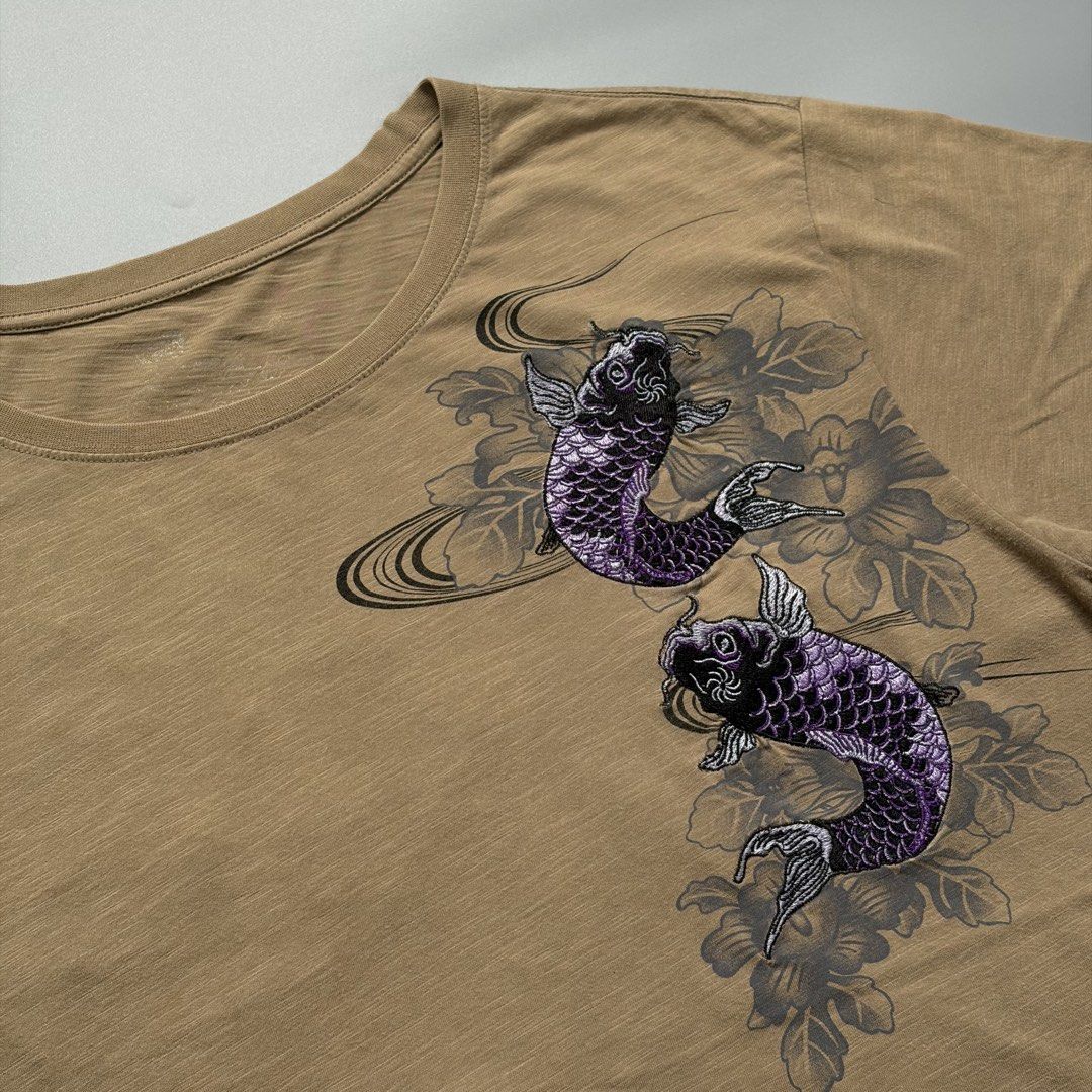 Embroidered Koi Fish (Category: Tshirts & Polo Shirts ) located in Cavite. Submitted by onebeancent (Listing ID 1456616496, Image 3). Description: 🔘Random Embroidered Koi Fish Size: XL Dimension: 23" Width | 28" Length Color: Brown Color Rate: 9/10 Issue: Verygood Condition: 2 pinhole see last 2 pics Price: 250php Additional Shipping Fee (J&T Small Pouch) 75php Luzon 100php visayas 120php mindanao.