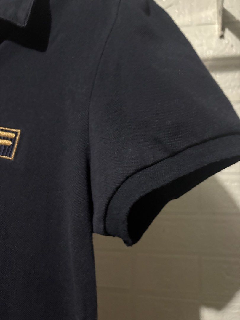 FILA GOLD POLO SHORT SLEEVE (Category: Others Tops) located in Taguig. Submitted by sagexoxo (Listing ID 1456644260, Image 2). Description: never been used padala from dubai medium no issue extra button.