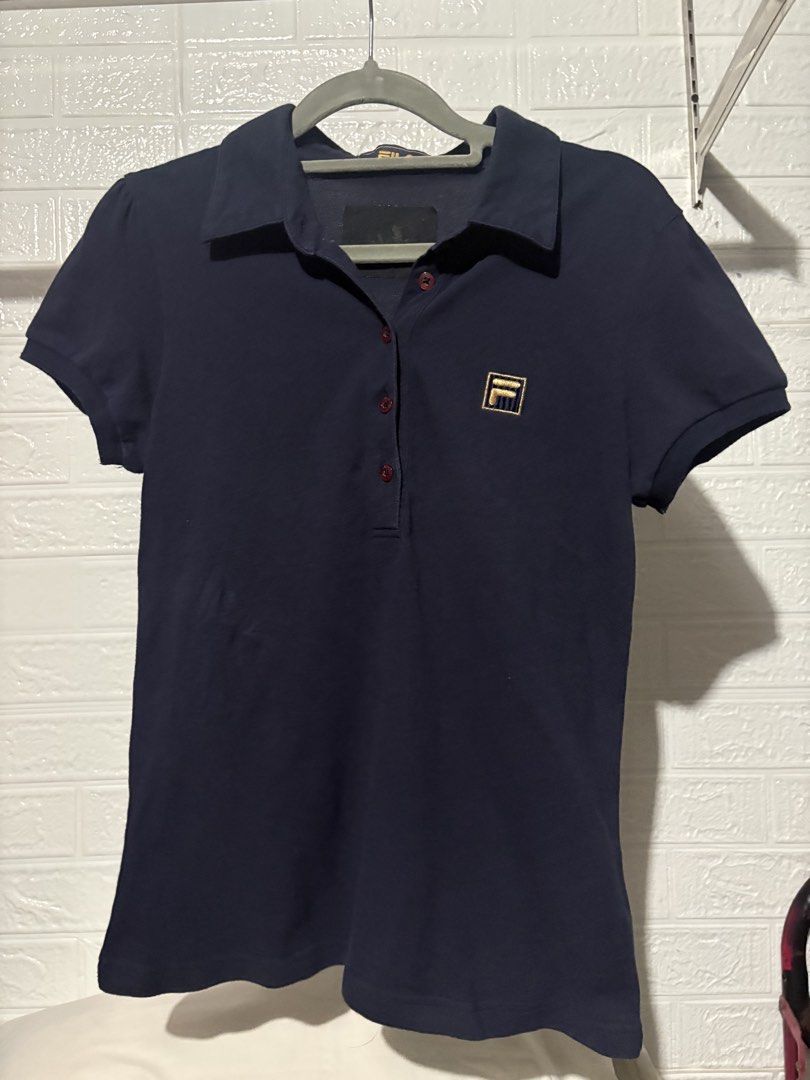 FILA GOLD POLO SHORT SLEEVE (Category: Others Tops) located in Taguig. Submitted by sagexoxo (Listing ID 1456644260, Image 1). Description: never been used padala from dubai medium no issue extra button.