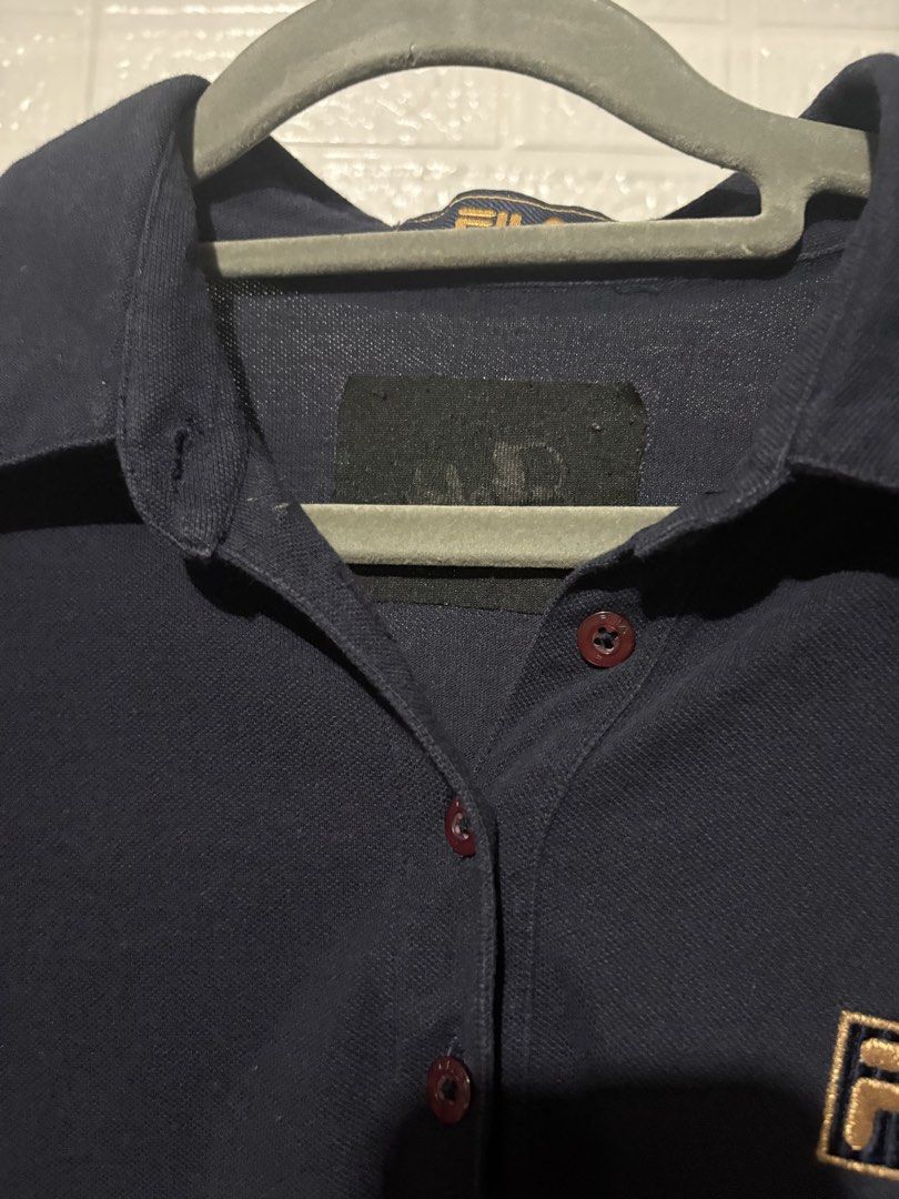 FILA GOLD POLO SHORT SLEEVE (Category: Others Tops) located in Taguig. Submitted by sagexoxo (Listing ID 1456644260, Image 3). Description: never been used padala from dubai medium no issue extra button.