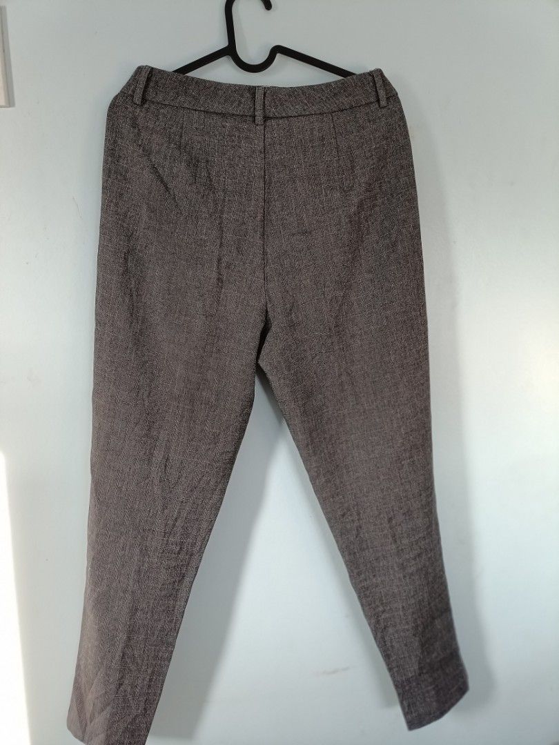 Grey Herringbone Pattern Trousers (Category: Trousers) located in Malabon City. Submitted by coollion.15fe1d (Listing ID 1456689305, Image 2). Description: - Classic fit grey trousers - Subtle herringbone pattern - Button and zip closure - Two side pockets - Back pockets sewn shut (can be opened) - Versatile for work or casual occasions.