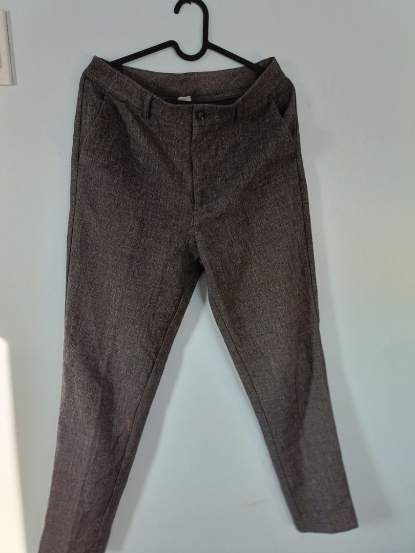Grey Herringbone Pattern Trousers (Category: Trousers) located in Malabon City. Submitted by coollion.15fe1d (Listing ID 1456689305, Image 1). Description: - Classic fit grey trousers - Subtle herringbone pattern - Button and zip closure - Two side pockets - Back pockets sewn shut (can be opened) - Versatile for work or casual occasions.