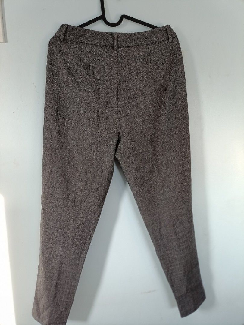 Grey Herringbone Pattern Trousers (Category: Trousers) located in Malabon City. Submitted by coollion.15fe1d (Listing ID 1456689305, Image 3). Description: - Classic fit grey trousers - Subtle herringbone pattern - Button and zip closure - Two side pockets - Back pockets sewn shut (can be opened) - Versatile for work or casual occasions.