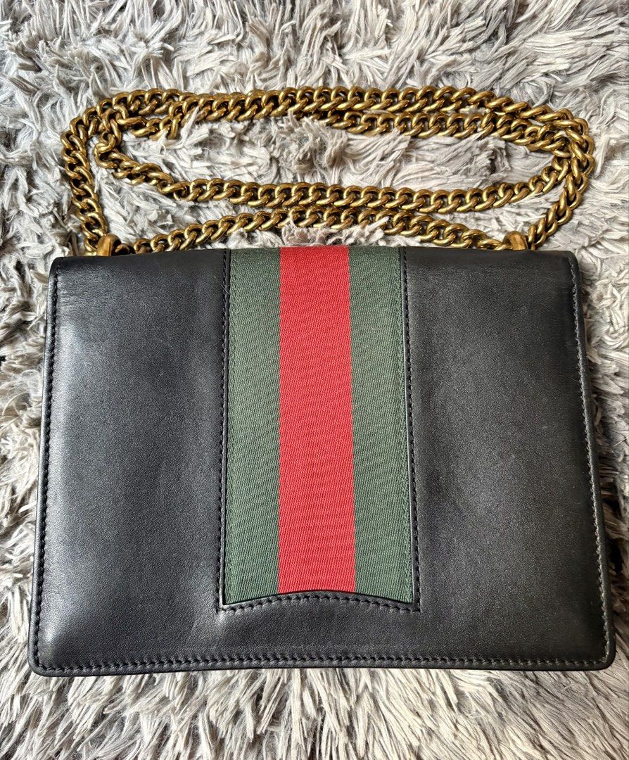 Gucci shoulder bag (Category: Luxury Bags & Wallets) located in Manila. Submitted by jlj_v.2_oshop (Listing ID 1456658242, Image 2). Description: OG Gucci Peony Medium Eye Chain Shoulder Bag in black leather featuring an embellished crystal eye appliqué and a gold-tone bow detail. .