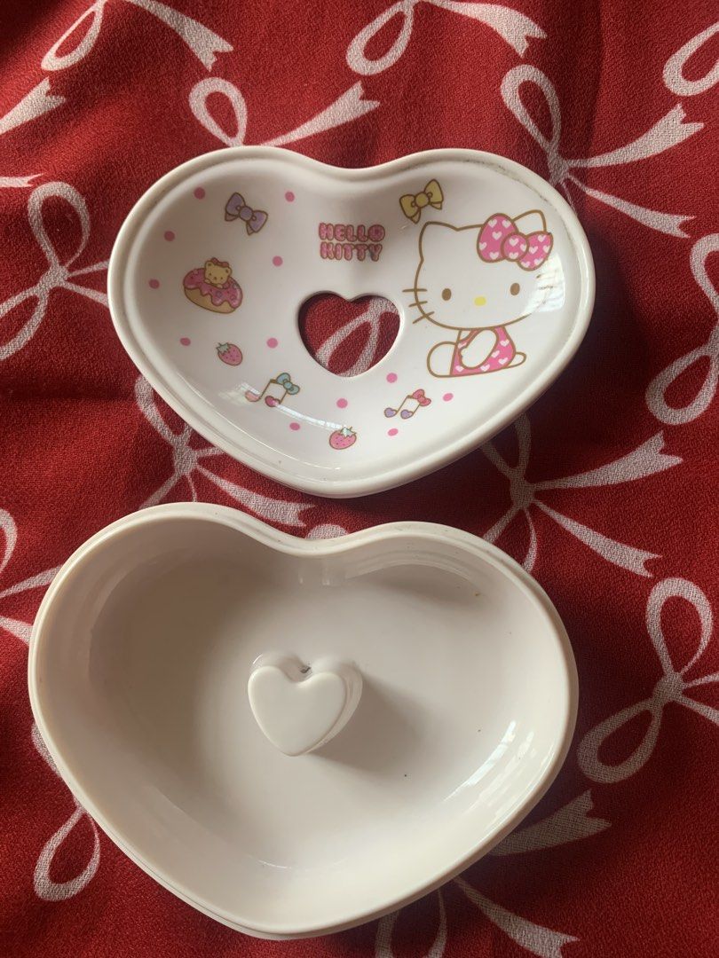 Hello Kitty Heart Shaped Dish with Cutout (Category: Other Kitchenware & Tableware) located in Navotas City. Submitted by elaitems (Listing ID 1456662544, Image 2). Description: - Adorable heart-shaped dish featuring Kitty. - Features a charming cutout in the middle. - Perfect for holding trinkets, jewelry, or small snacks. - A delightful gift for any Kitty enthusiast. .