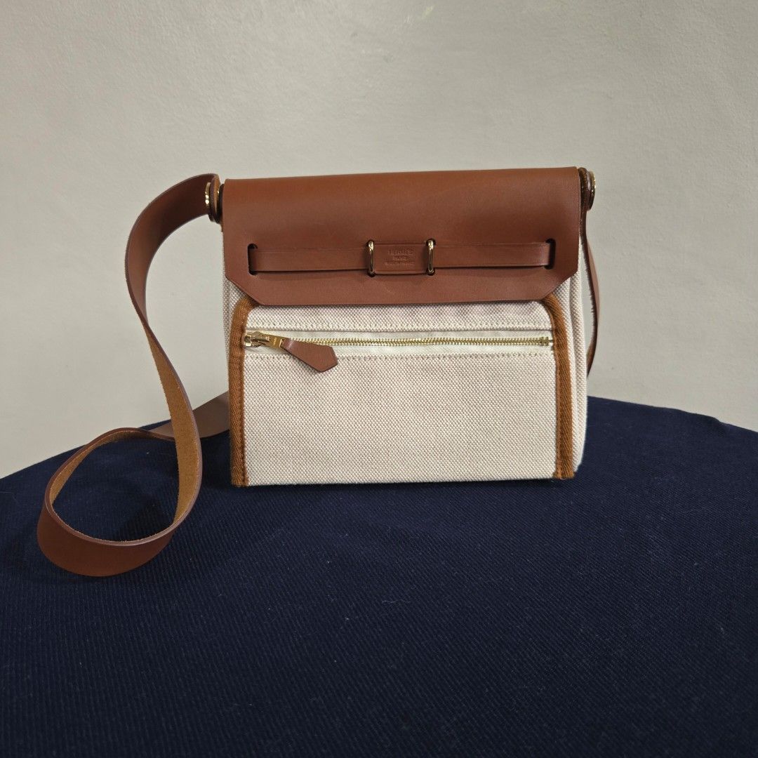 Herbag Mini (Category: Luxury Bags & Wallets) located in Paranaque City. Submitted by dclutterqueen (Listing ID 1456624111, Image 2). Description: Hermes Herbag mini size in brown and ecru color 💯 Genuine leather and canvas material 🇯🇵Acquired preloved from Japan 👜 Measures approximately 20 x 17 x 7 cm.