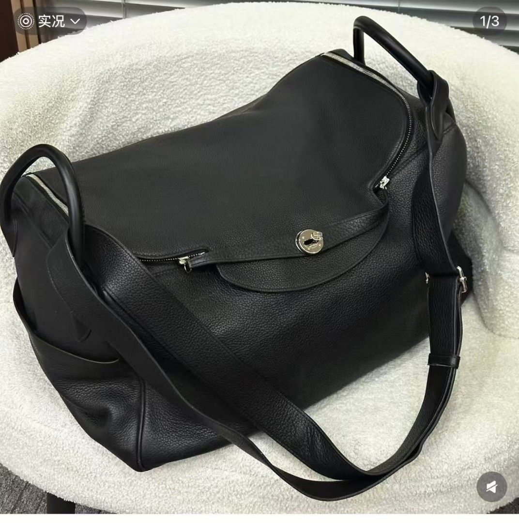 Hermes Evelyne TPM Black Leather (Category: Luxury Bags & Wallets) located in Manila. Submitted by brightdragon.23aa99 (Listing ID 1456691425, Image 2). Description: - Genuine black leather bag - Versatile with shoulder strap and top handles - Multiple secure zip compartments - Stylish silver hardware details - Ideal everyday bag, fits all your essentials.