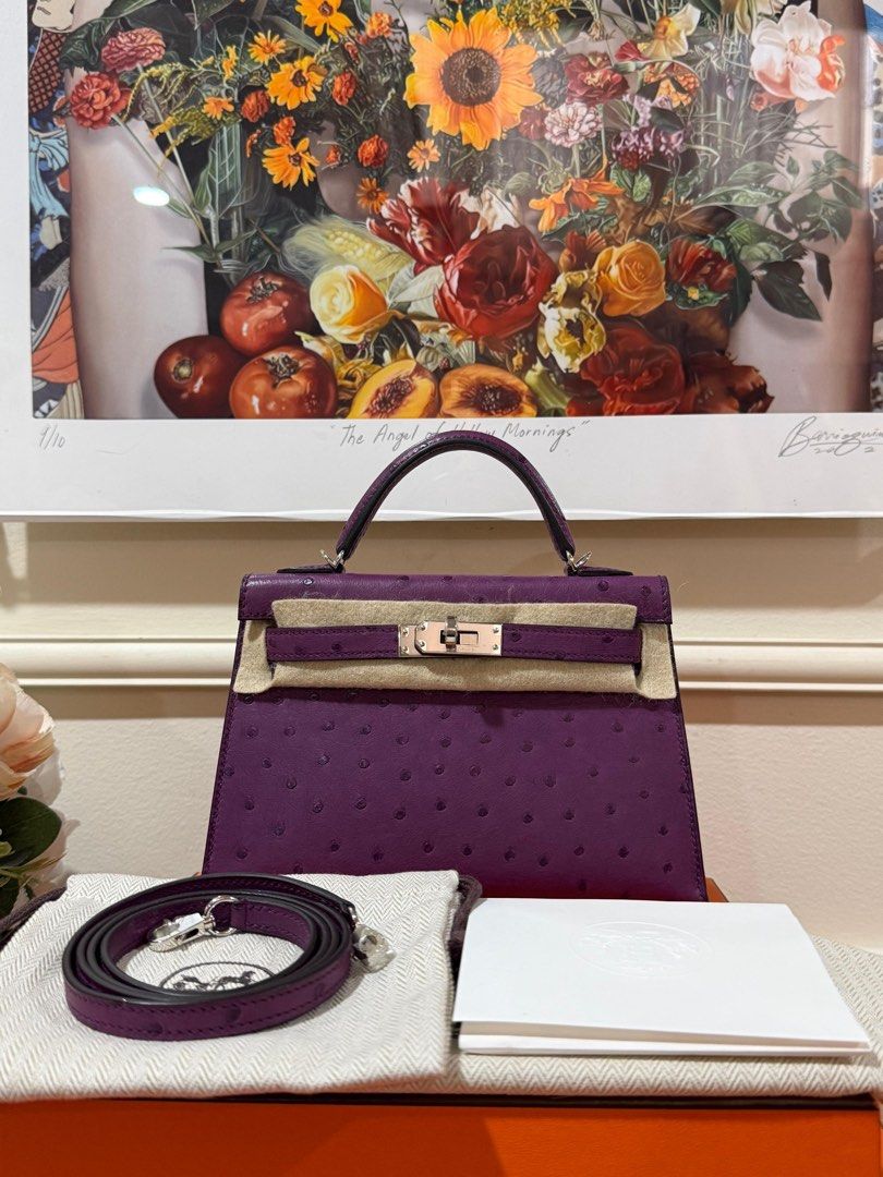 Hermes Mini Kelly (Category: Luxury Bags & Wallets) located in Taguig. Submitted by consumergoodstrading (Listing ID 1456661329, Image 2). Description: Hermès Mini Kelly Exquisite Anemone Ostrich • Size: Mini Kelly • Color: Anemone • Leather: Ostrich • Hardware: PHW • Stamp: W A stunning Mini Kelly in rich Anemone Ostrich, beautifully complemented by PHW. Elegant, rare, and effortlessly luxurious — a true collector’s piece For More Details Pm Me 