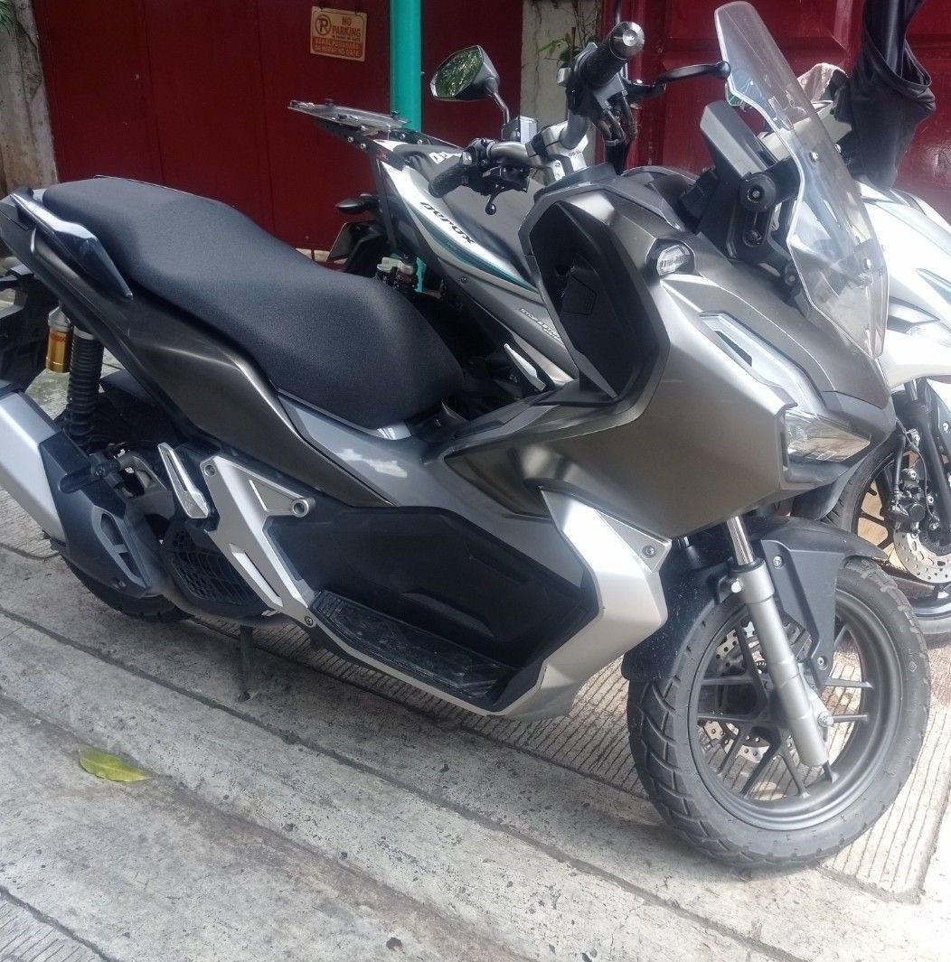 Honda ADV 150 Scooter (Category: Motorbikes for Sale) located in Quezon City. Submitted by ratatatataaz (Listing ID 1456617294, Image 1). Description: Honda ADV 150 2020 16,xxx ODO (Actual 15,900) 2 Remote Keys with plate New set of tires (June 2026) All Stock Under my name (1st owner) issue: paso rehistro (feb 2026) P R I C E N E G O location: UP DILIMAN.