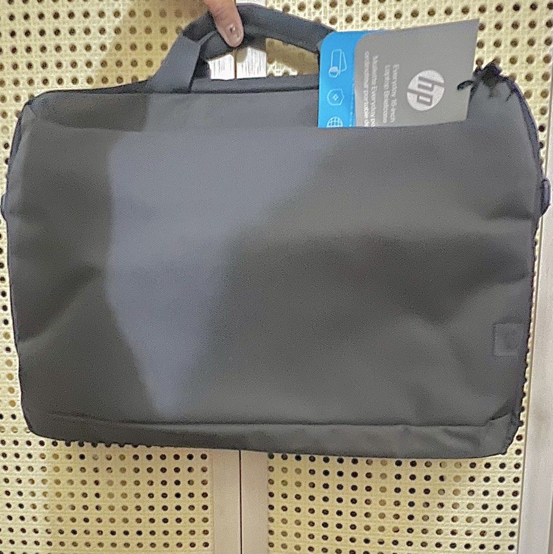 HP Laptop Bag 14-inch (Category: Laptop Bags & Sleeves) located in Manila. Submitted by oddmoon-27a3 (Listing ID 1456776622, Image 2). Description: - HP Laptop Bag - Fits 14-inch laptops - Color: Dark Grey - Features: Main compartment and front pocket - Includes detachable shoulder strap - Ideal for daily commutes and travel - Easy to carry.