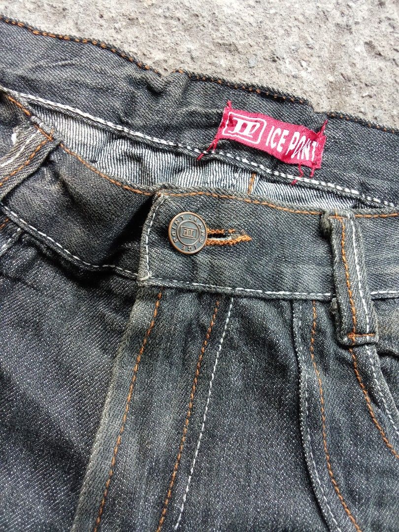 ICE POINT Jeans with Dragon Embroidery (Category: Jeans) located in Polomolok. Submitted by timog_high_ice (Listing ID 1456630721, Image 3). Description: - Dark wash distressed denim jeans - Unique dragon embroidery on back pocket - Orange and white stitching details - Button fly closure - Perfect statement piece for your wardrobe Yes i. Solid yan 🫶.