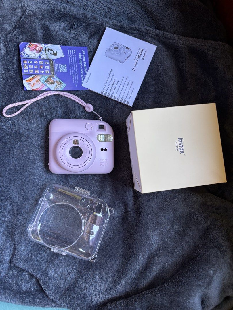 Instax Mini 12 in Pink (Category: Cameras) located in Baguio. Submitted by pinkynj (Listing ID 1456728226, Image 1). Description: New pa, once used only. With warranty, case, & box Shipping fee by the buyer (via J&T).
