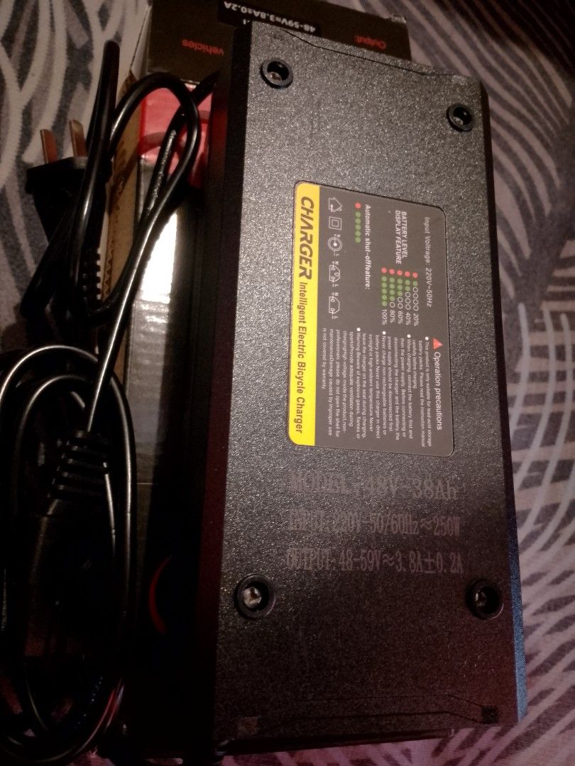 Intelligent Ebike charger 48v4A (Category: Chargers) located in Manila. Submitted by keendeer.6c83cc (Listing ID 1456660943, Image 3). Description: brand new ebike charger for 48v lead acid battery auto shutdown when fully charged .
