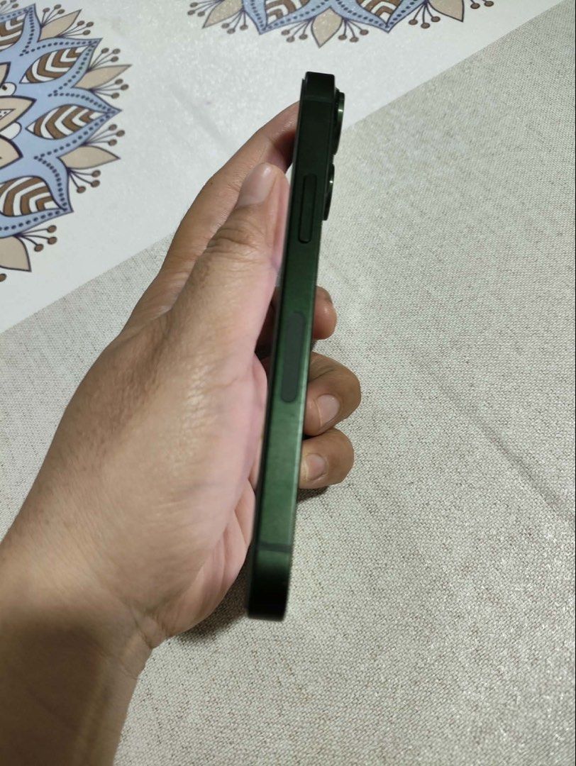 Iphone 13 mini (Category: iPhone 13 Series) located in Manila. Submitted by kenjordan541489 (Listing ID 1456614237, Image 3). Description: Iphone 13 mini Lasy owned 98%smooth my maliit lang n paint chip 85% bh replaced by genuine apple No issue Di masyado nagamit Test all u want Package Box same imei. To follow nlng naiwan s qc Unit Case Orig chord Bawal sa barat Loc: paranaque.