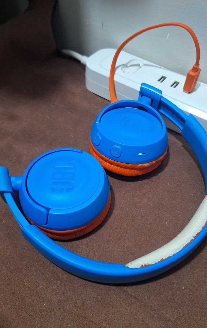 JBL Kids Headphones (Category: Headphones & Headsets) located in General Trias. Submitted by aeunice (Listing ID 1456667483, Image 2). Description: Brand & Model: JBL JR300BT Color: Combination of Blue and Orange In Good Working Condition. Wireless Bluetooth Headphones (Blue/Orange). Minor wear on earcups/headband. Works great! Includes charging cable. Meet up / Shipping via Lalamove, JnT, Gogo Express & LBC..