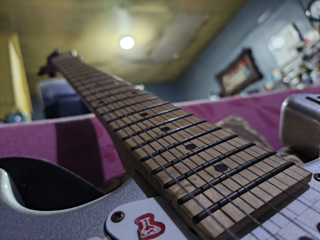 JCraft Classic Stratocaster - Silver Sparkle (Category: Musical Instruments) located in Las Pinas. Submitted by maya.a01 (Listing ID 1456658936, Image 3). Description: - Jcraft Stratocaster in silver - If nabobother sa stickers, tatanggalin ko na lang po tas lilinisin!!! -Orig price 7k inclusions: picks and one pedal (May issue) -Wala na pong bag ISSUE: Wirings. (Buzz ang lumalabas sa amp. tutunog lng siya pag nasa tamang kalikot na yung jack) ST