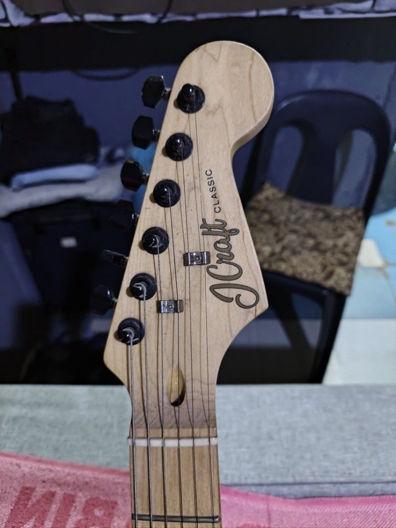 JCraft Classic Stratocaster - Silver Sparkle (Category: Musical Instruments) located in Las Pinas. Submitted by maya.a01 (Listing ID 1456658936, Image 2). Description: - Jcraft Stratocaster in silver - If nabobother sa stickers, tatanggalin ko na lang po tas lilinisin!!! -Orig price 7k inclusions: picks and one pedal (May issue) -Wala na pong bag ISSUE: Wirings. (Buzz ang lumalabas sa amp. tutunog lng siya pag nasa tamang kalikot na yung jack) ST