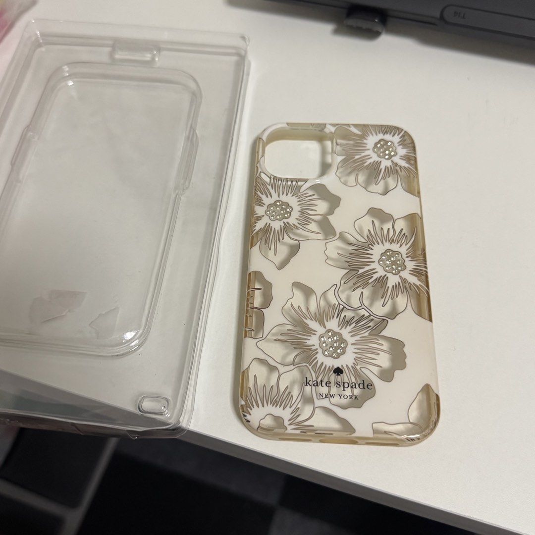 Kate Spade iPhone 13 case (Category: Cases & Sleeves) located in San Pedro. Submitted by hygo.mnl (Listing ID 1456769922, Image 1). Description: Authentic from US Seldom used but nastuck na Needs cleening yung side, a bit yellowish.
