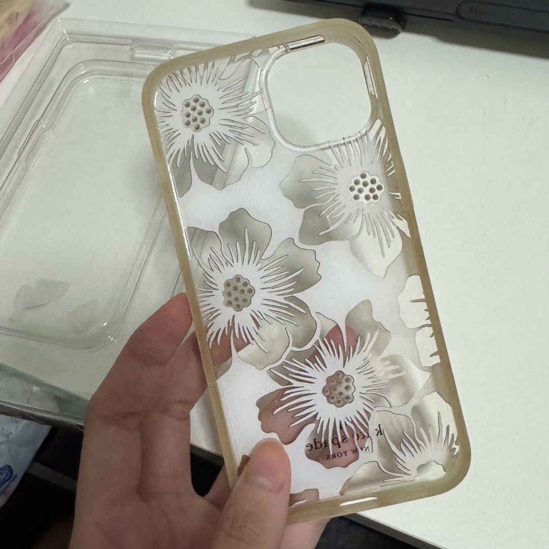 Kate Spade iPhone 13 case (Category: Cases & Sleeves) located in San Pedro. Submitted by hygo.mnl (Listing ID 1456769922, Image 2). Description: Authentic from US Seldom used but nastuck na Needs cleening yung side, a bit yellowish.