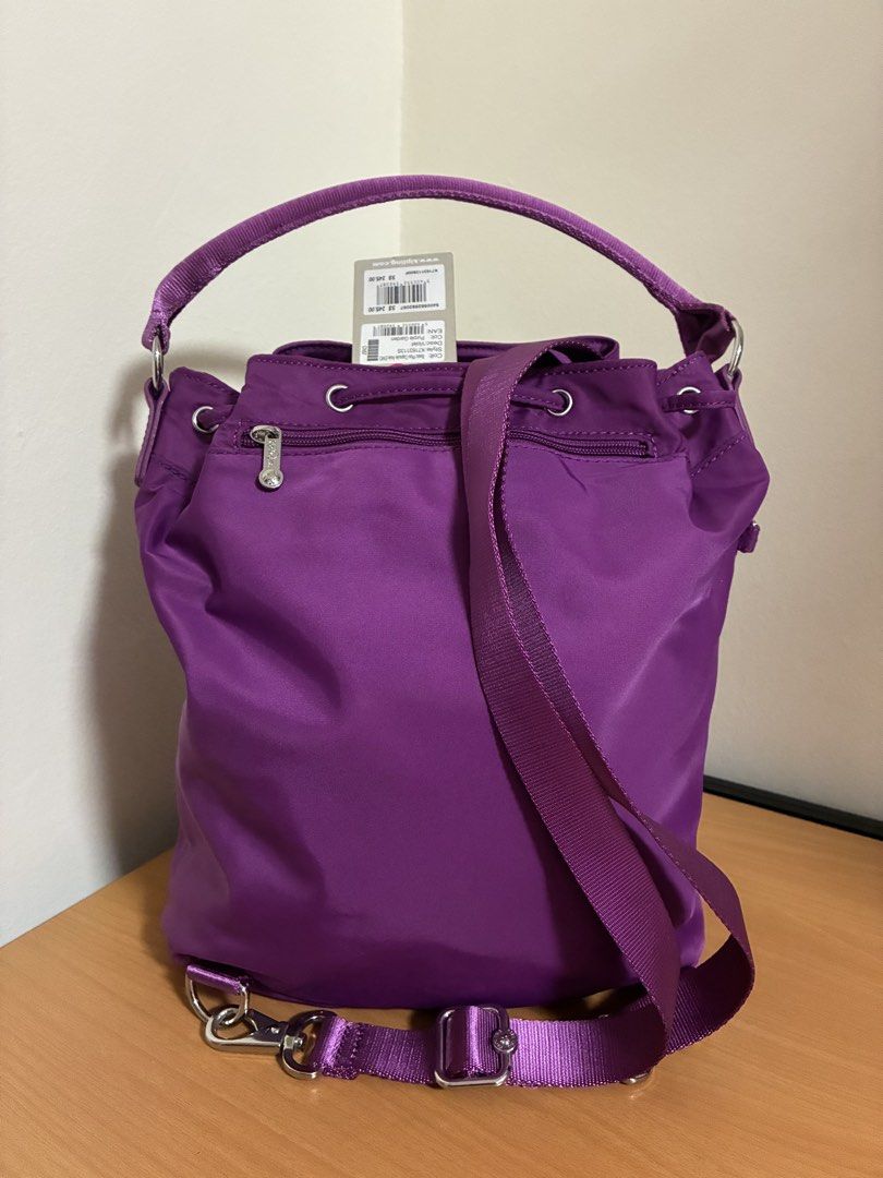Kipling Purple Drawstring Backpack (Category: Backpacks) located in Singapore. Submitted by tbh.168 (Listing ID 1456770647, Image 2). Description: ***Brought this at $245 & Never use ***Kipling backpack in Purple Garden. Drawstring closure, front zip pocket. Includes tags. Great for daily use..