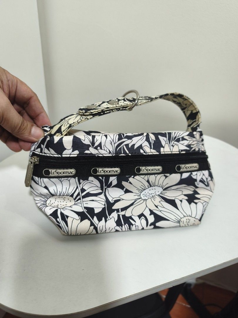 LeSportsac (Category: Purses & Pouches) located in Quezon City. Submitted by gametz (Listing ID 1456772457, Image 3). Description: Original Item LeSportsac pouch/ carry on -like new - excellent condition - no issue - very cute in actual.