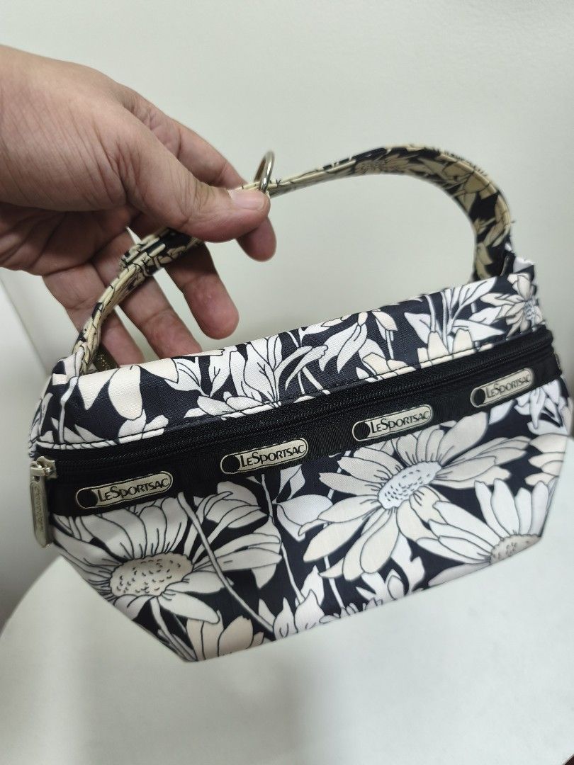 LeSportsac (Category: Purses & Pouches) located in Quezon City. Submitted by gametz (Listing ID 1456772457, Image 1). Description: Original Item LeSportsac pouch/ carry on -like new - excellent condition - no issue - very cute in actual.