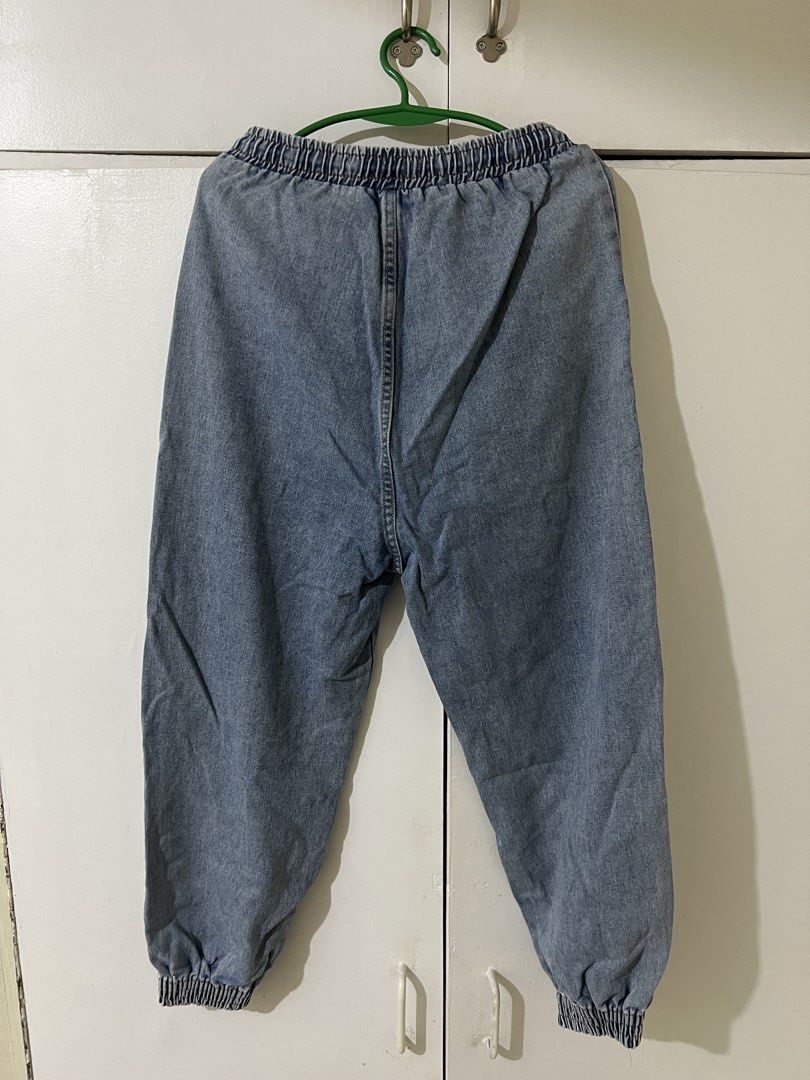 Light Wash Denim Jogger Pants with Drawstring Waist (Category: Jeans) located in Quezon City. Submitted by airajaime (Listing ID 1456649383, Image 2). Description: - Light wash denim joggers - Elastic waistband with white drawstring - Cuffed ankles for a relaxed fit - Two side pockets - Ideal for casual wear - Heavy denim material, keeps its baggy shape and doesn't fall down like fake denim Measurements laid flat: Waist: 26-27 in (adjustable with