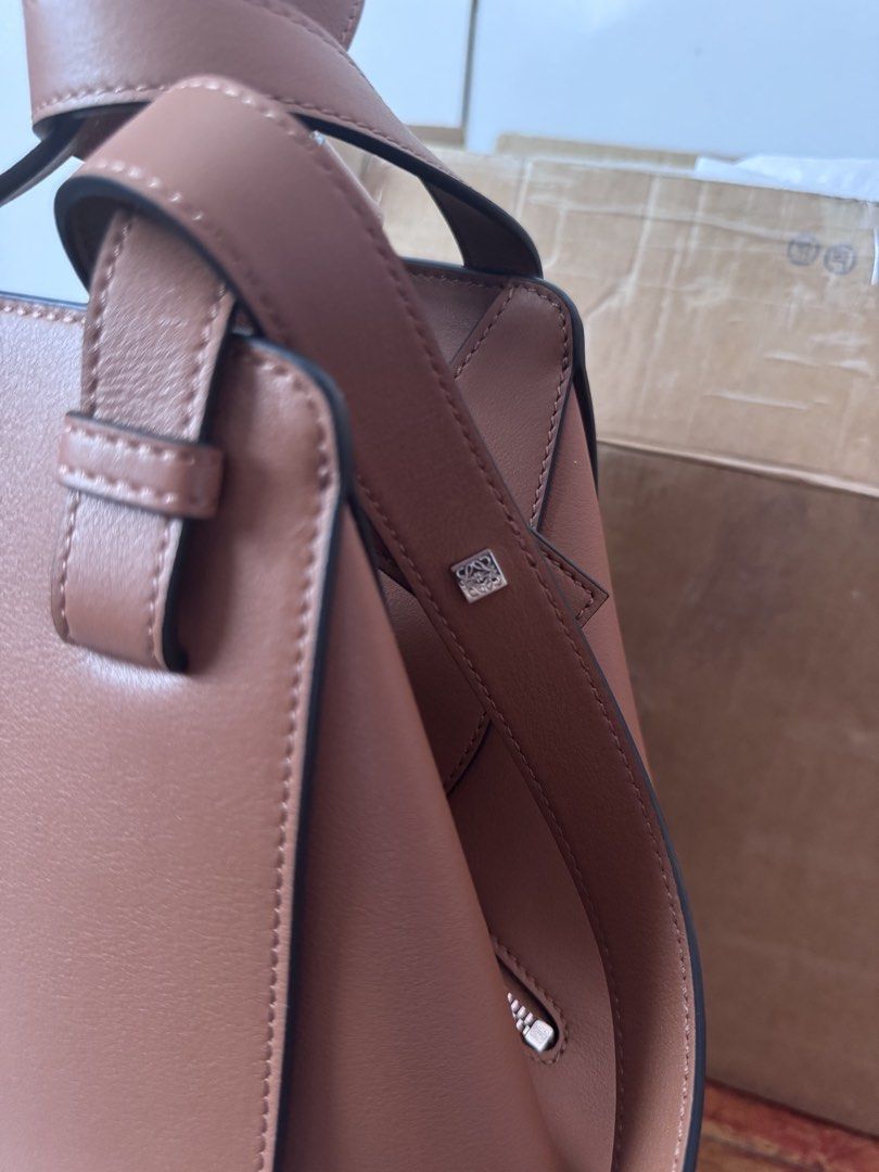 Loewe Compact Hammock in Tan (Category: Luxury Bags & Wallets) located in Cabuyao City. Submitted by patitay.osa (Listing ID 1456656190, Image 3). Description: Complete with box and dustbag. With physical receipts and a packaging box. Don’t hesitate to make an offer! We can try to negotiate and meet half way. Please message for me for request photos and details. Thank you! .