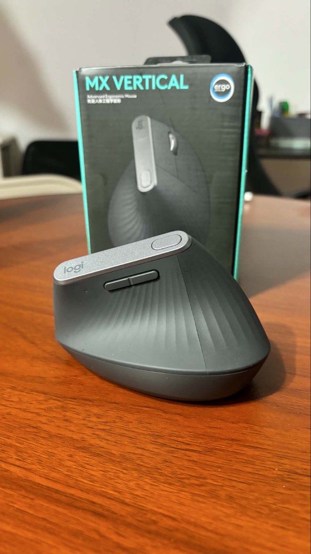 Logitech MX Vertical Ergonomic Mouse (Category: Mouse & Mousepads) located in Pasig City. Submitted by tiny_a (Listing ID 1456702499, Image 2). Description: Logitech MX Vertical Ergonomic Mouse Selling my Logitech MX Vertical! Gift from someone, tried it for about an hour lang and turns out it’s not for me — grip/shape is uncomfy. Rest is basically unused. Condition: Like new, barely used (~1 hour total to try only). No scratches, no defects. Wit