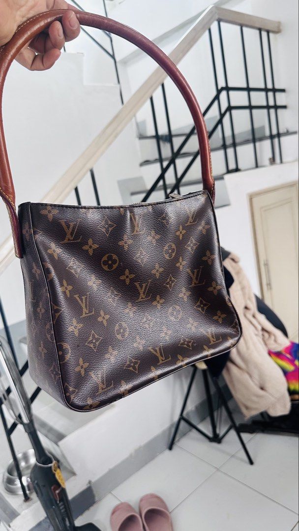 Louis Vuitton Monogram Canvas Shoulder Bag (Category: Luxury Bags & Wallets) located in Manila. Submitted by preloved.brand2023 (Listing ID 1456615053, Image 1). Description: - Authentic Louis Vuitton shoulder bag - Classic monogram canvas with leather trim and handles - Secure zipper closure - Interior includes a zippered pocket and slip pockets - Made in France - Ideal for everyday use.