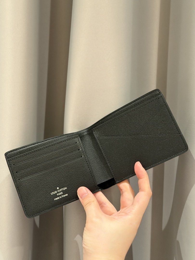 LV Louis Vuitton Multiple Wallet Damier Graphite (Category: Luxury Bags & Wallets) located in Pasay City. Submitted by do.es (Listing ID 1456752826, Image 3). Description: Good as new, material is so nice. Look through the photos. Minor flaw on last photo..